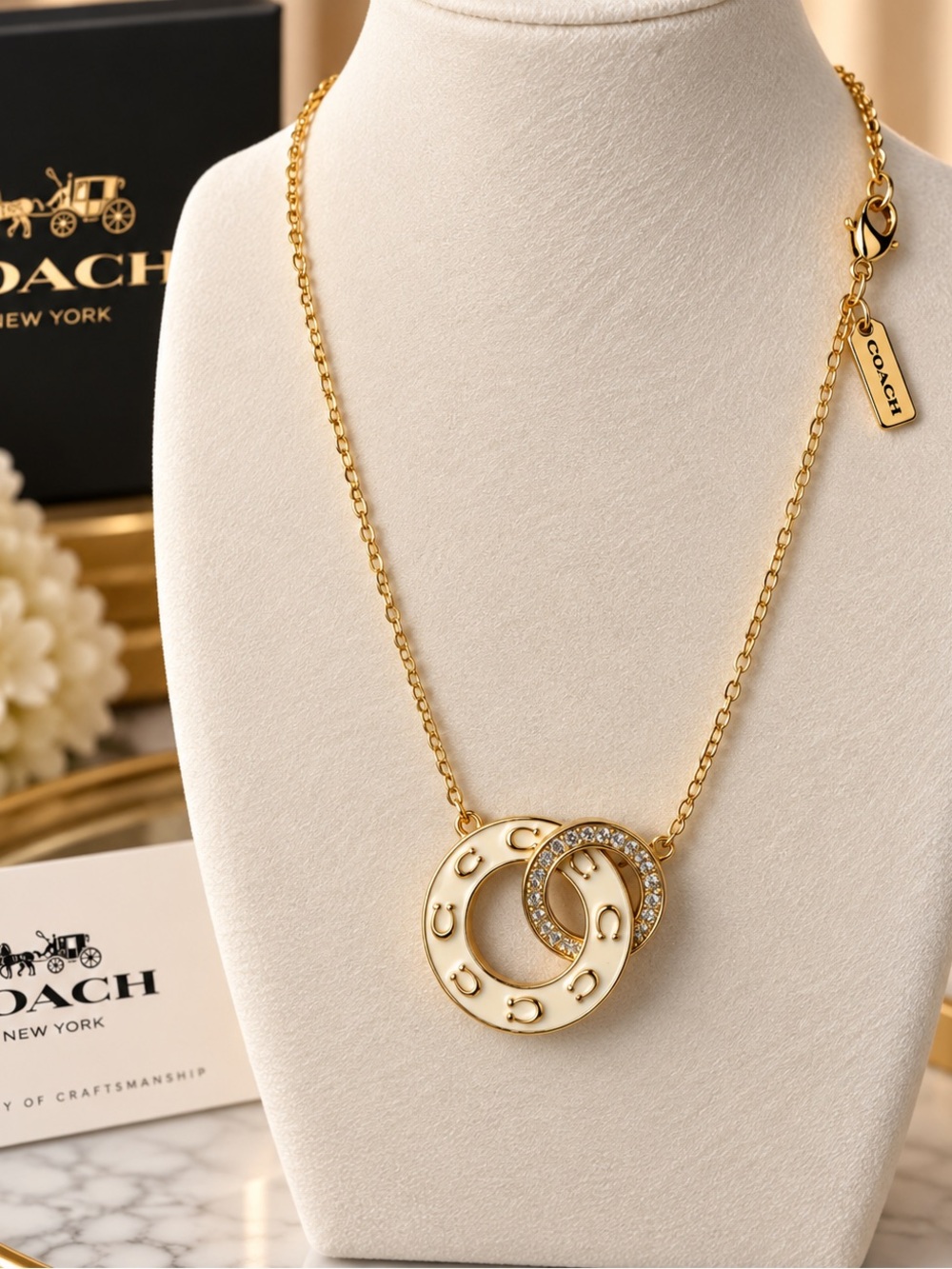 COACH Gold and Cream Interlocking Circle Pendant Necklace
